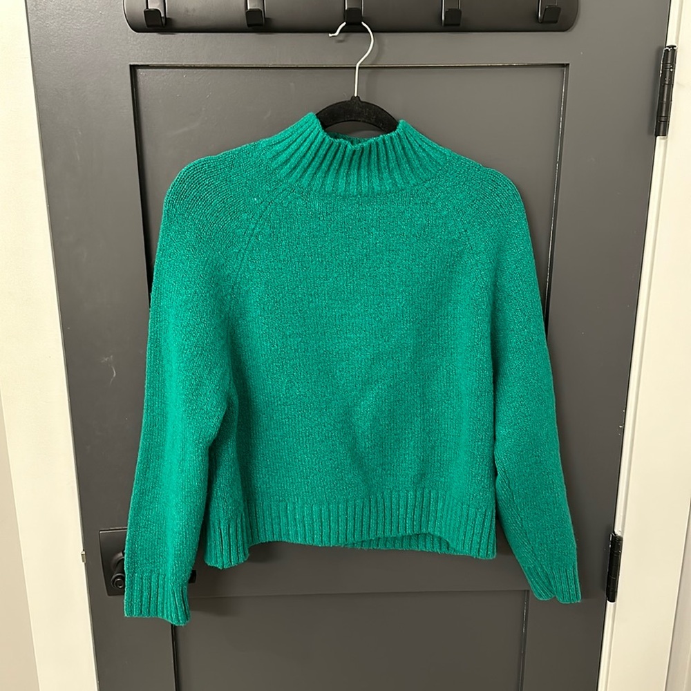 Kelly green turtleneck sweater